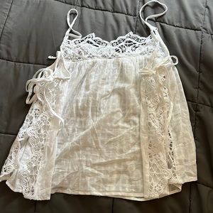 Medium American Eagle white top with lacy open sides